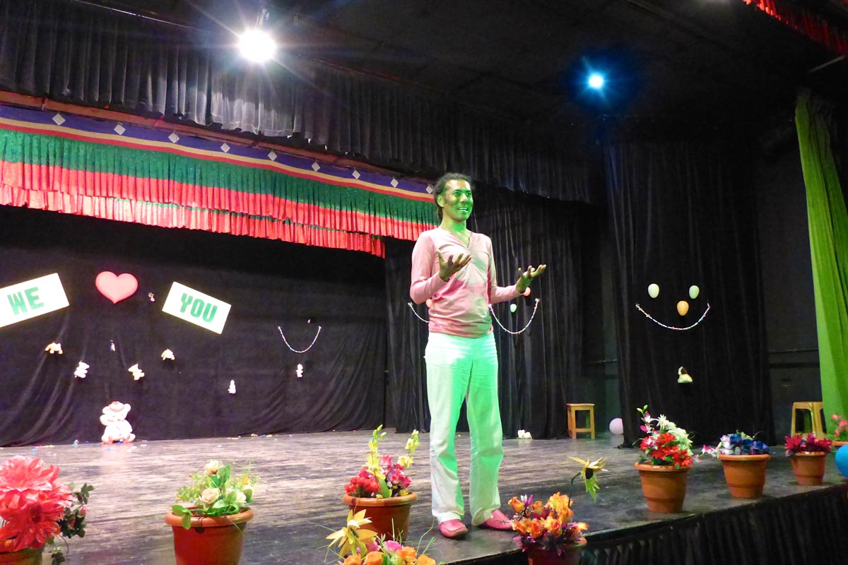 Pageant Director Lobsang Wangyal on stage at TIPA during rehearsal.