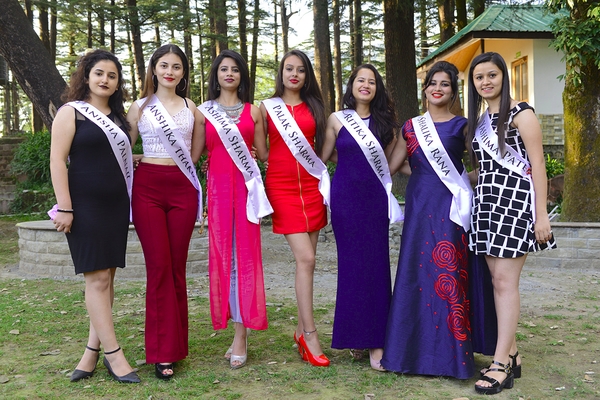 Miss Himalaya Pageant 2018 contestants: Anisha Palnail, Anshika Thakur, Ashima Sharma, Palak Sharma, Ritika Sharma, Shalika Rana, and Yashima Patel pose for a photo during a meet the press event in McLeod Ganj, India, on 4 October 2018.