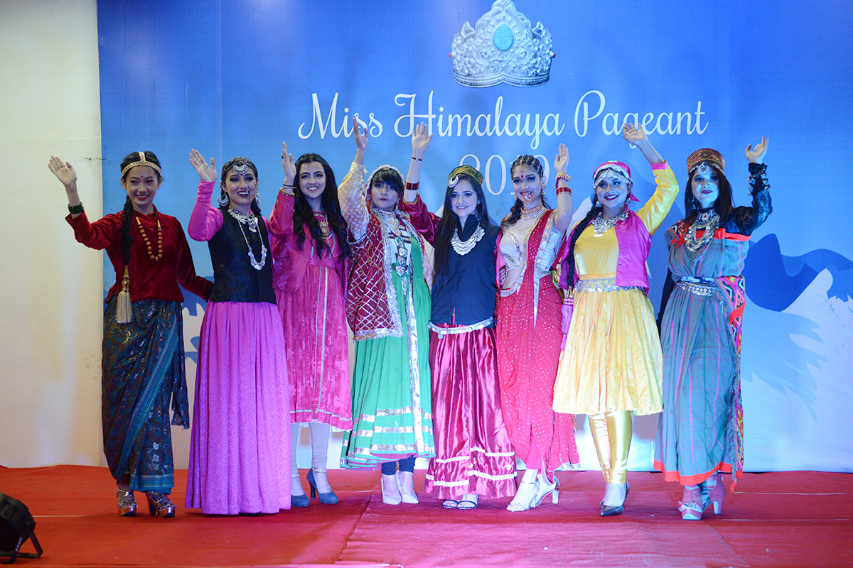 The contestants of the Miss Himalaya Pageant 2019 pose during the Traditional Costume Round.